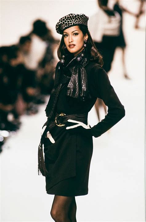 Yasmeen Ghauri walks the runway at the Yves Saint Laurent 